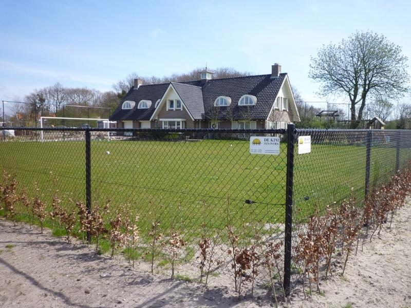 Gaashekwerk bij een woonhuis
